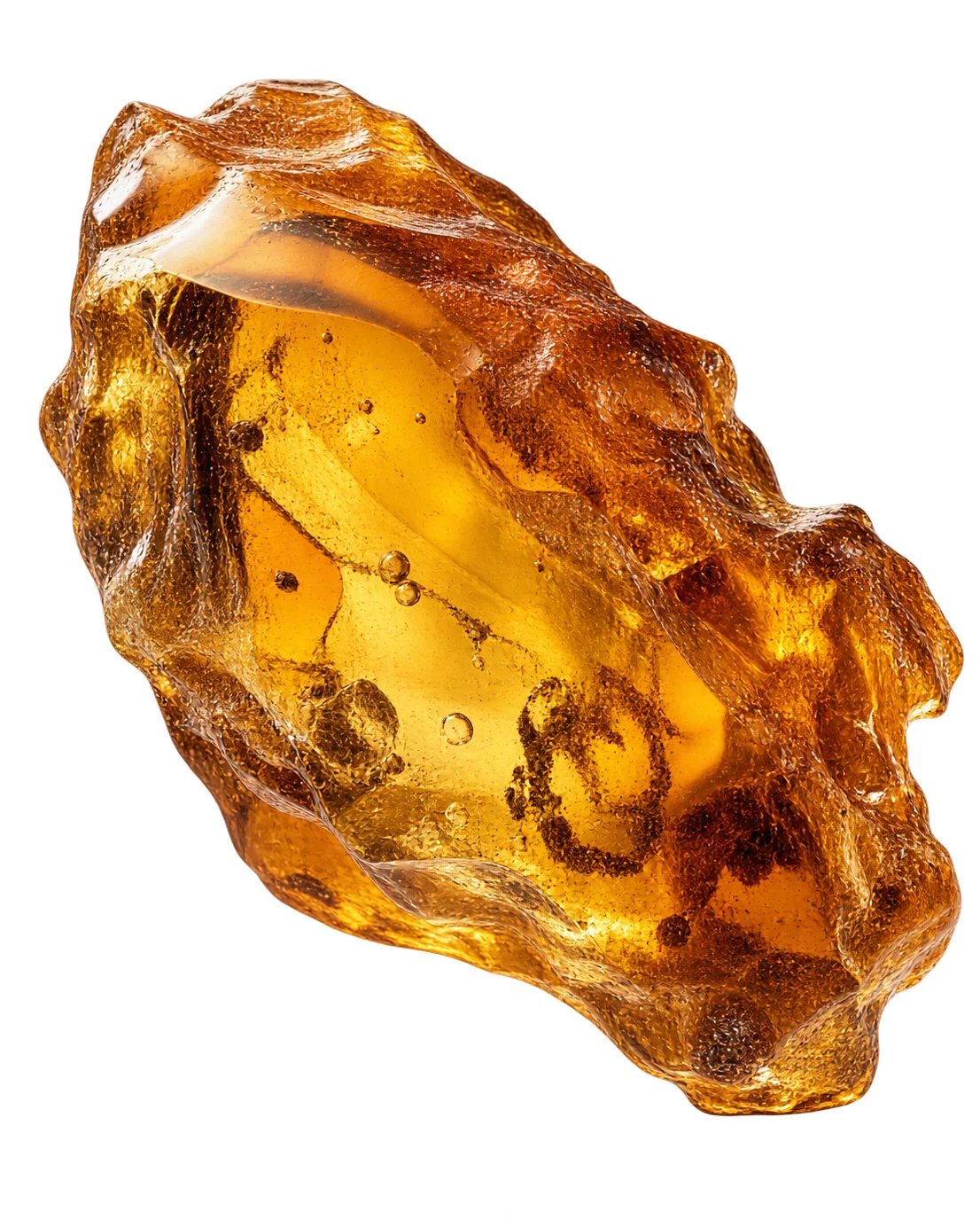 A glowing, irregular piece of golden amber resin